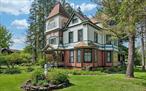 Iconic Queen Anne Victorian - Historic Gem with Adaptive Reuse Potential.Stunning Queen Anne Victorian property listed on the Historical Registryâ€”a distinguished asset that combines architectural significance with both residential and commercial potential.Situated on 2.77 acres, this landmark property showcases timeless design elements such as ornate woodwork, stained-glass windows, inlaid hardwood floors, and original corbels and medallions, creating an ideal foundation for a high-end destination business, adaptive reuse, or strategic investment. Potential concepts include boutique hospitality ventures, restaurants, retail or service establishments, artist studios, live-work concept or just a spectacular weekend/fulltime home.The expansive main level features generous, light-filled rooms, formal parlors, dining areas, a country-style kitchen, office/den space, and full bath. The second floor offers five large rooms with ample storage and balcony access plus a secondary bonus room. The third floor, currently unfinished but plumbed for a bathroom, presents an excellent value-add opportunity. The detached Carriage House further enhances the propertyâ€™s income-producing potential. With its own unique character and footprint.(H) Hamlet zoning allows for a wide range of uses including artist studios, bed & breakfast, hotels, inns, restaurants, banks, funeral homes, retail, service, day-care, govâ€™t offices, home occupations. Located in the heart of the Greenville hamlet, this property benefits from proximity to the vibrant Hudson Valley and Great Northern Catskills corridor, a region experiencing significant growth in tourism, remote work hubs, and destination-driven businesses surrounded by golf courses, hiking trails, breweries, ski resorts, and farm-to-table dining. The property is just 30+ minutes from Albany, Hudson, and Saugerties, and approx. 2 hours from New York City, itâ€™s a rare opportunity for a weekend or full-time home, destination business, adaptive reuse, or strategic investment.