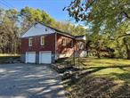 ** Multiple offers - Highest and best due by Wednesday**** This charming brick ranch, full of warmth and character, sits proudly on a sprawling 1 acre corner lot within the highly desirable New Paltz School District. Step onto the welcoming front porch and into a bright, inviting living room featuring fresh paint, modern vinyl flooring, updated lighting, and decorative built-in shelving that adds timeless appeal.The sunny, retro-style eat-in kitchen offers brand new stainless steel appliances and plenty of space for dining. Just off the kitchen, youâ€™ll find a sunroom filled with natural light â€” perfect for entertaining or relaxing year-round.Two spacious bedrooms on the main floor showcase gleaming hardwood floors and abundant sunlight, while a third room provides the perfect spot for a den, home office, or guest space. The full bathroom features ample storage and a thoughtful layout ideal for everyday living.A walk-up attic offers great storage or potential for additional living space, while the full walkout basement provides even more flexibility for storage or future finishing. The attached two-car garage adds convenience and practicality throughout the seasons.Move-in ready and full of charm, this home combines comfort, style, and character in one perfect package. Donâ€™t miss your chanceâ€”schedule your showing today!