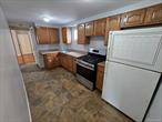 Freshly Painted 1st Floor 3 Bed 1 Bath Apartment With All Utilities Included, Shared Yard, Modern Bathroom, Gas Cooking & Front Porch