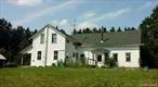 Located on a tranquil, nearly 3-acre parcel in Homer, NY, this property offers significant potential for the right buyer. The lot features a 5-bedroom, 1-bathroom home in need of substantial renovation, a spacious 3-car garage, and a barn currently occupied by squatters. A trailer is also present on-site.This property is being sold as-is, with no representations or warranties. All information must be independently verified by the buyer. Buyer is solely responsible for securing possession, including addressing the presence of squatters.Ideal for investors or those seeking a project with long-term upside. Showings and access may be limited due to occupancy status.