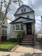 1 Dwelling Home Located in the Heart of Elmhurst. Corner Property with 2 Car Garage. Located Near Transportation, Schools, Restaurants, Supermarkets, and More.
