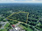 Rare large land parcel located within 1 mile of Uptown Kingston and NYS Thruway exit 19, Kingston. The 16+ acre parcel features municipal water and sewer available on the street, as well as a preliminary conforming site plan for 14 lots at the top of the property, which could accommodate single or two-family homes. Access for the proposed development will be off the Hillside Acres subdivision (Hillside Terrace). The land is located adjacent to one of the most prestigious neighborhoods in Ulster County and within walking distance to one of the most desirable 18-hole golf resorts in the area (Wiltwyck Golf Club) with exceptional amenities, a large golf resort, pool, tennis, driving range, restaurant, and catering hall. The owner has engaged a local engineer for the current site plan along with the Town Building Department; all representations are feasible under R-30 Town zoning. Please see attached documents for preliminary site plan, county records, and zoning uses.