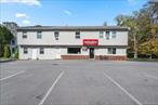 Prime investment opportunity in Campbell Hall! This well-maintained mixed-use property is ideally located on the highly traveled Route 207, offering excellent visibility and steady traffic flow. The building features a successful, long-established pizza restaurant with a full commercial kitchen, dining area, and restroom facilitiesâ€”currently operating under a 5-year lease with a 5 year renewal option. You will also find two fully leased residential apartments: a 4-bedroom, 2-bath unit and a 2-bedroom, 1-bath unitâ€”each with separate electric meters and tenants paying their own utilities. The property also includes a private well, septic system, and a small office space perfect for an owner or additional rental use. ALL TENANTS PAY THEIR OWN UTILITIES. With a strong rental history and total annual gross income of approximately $90, 000, this property presents an exceptional opportunity for investors seeking stable returns in a desirable Hudson Valley location. Conveniently situated near major highways, local businesses, and area amenities, 2452 Route 207 combines consistent income, prime exposure, and long-term potential.