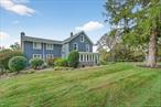 Welcome to 23 S Creek Rd â€“ In the heart of Staatsburg, this well-maintained 4-bedroom, 2.5-bath farmhouse perfectly balances timeless charm with modern functionality â€” ideal for those seeking a live/work lifestyle in the heart of the Hudson Valley.The homeâ€™s curved wrap-around front porch and detailed trim work showcase its classic farmhouse character. Inside, natural light fills warm and inviting spaces designed for comfort and connection. The kitchen flows seamlessly into the dining and living areas, perfect for family gatherings or entertaining. Upstairs, four bedrooms provide room for everyone and don&rsquo;t miss the walk up attic â€” offering flexibility for a home office, studio, or guest suite.Step outside and youâ€™ll find your own private resort â€” a sparkling pool with patio, outdoor kitchen, and lanai designed for endless summer gatherings.A two story, detached three-car garage provides ample parking and storage, while the massive barn offers incredible versatility for contractors, car enthusiasts, or hobbyists. Best of all, the barn enjoys its own separate driveway entrance from Route 9G, making it a dream setup for a business, workshop, or studio space with privacy from the main residence.Whether youâ€™re looking to blend home and work life, host unforgettable gatherings, this house delivers it all â€” with easy access to Rhinebeck, Hyde Park, Wineries, Farms and the Hudson River just minutes away.