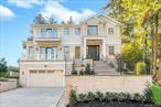 Stunning New Construction Residence In A Prime Location, Blending Timeless Elegance With Modern Comfort. This Exceptional Home, Located In One Of Manhasset&rsquo;s Most Desirable Neighborhoods, Offers Over 6, 150 Square Feet Of Meticulously Designed Living Space, Perfectly Crafted For Todayâ€™s Lifestyle.As You Step Inside, Youâ€™re Welcomed By Soaring Ceilings, Oversized Windows, And Custom Millwork Throughout. The Gourmet Chefâ€™s Kitchen Is Equipped With Top-Of-The-Line Appliances, Custom Cabinetry, A Large Center Island, And Opens Into The Spacious Den Featuring A Gas Fireplace And Easy Access To The Private Backyard â€” Ideal For Indoor-Outdoor Entertaining. The Main Level Also Offers A Formal Dining Room, Butler&rsquo;s Pantry, A Living Room/Guest Suite With En-Suite Bath, Home Office and Powder Room. Upstairs, The Luxurious Primary Suite Includes Two Walk-In Closets And A Spa-Inspired Bath With A Soaking Tub, Oversized Shower and Radiant Heated Floors. Three Additional Bedrooms, Each With En-Suite Bathrooms, and Laundry Room Complete This Level. The Fully Finished Walk-Out Basement Boasts High Ceilings, An Additional Bedroom and Full Bath, A Custom Bar, A Second Laundry Room, Mudroom And Ample Space For A Recreation Area, Gym, Or Media Room. Additional Features Include Radiant Heat Throughout, An Elevator Servicing All Floors, A Whole-House Generator, And A Two-Car Garage. Ideally Located in Close Proximity to the Strathmore Vanderbilt Country Club and Minutes from the Manhasset LIRR, Town, Americana Shopping Center and Dining , This Exceptional Strathmore Home Is A Must-See!