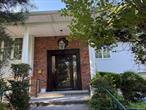 Welcome to this extraordinarily large residence, boasting an impressive stone and brick pillars lighted entryway. Home features 6 bedrooms, Master bedroom with Master Bath ( one bedroom can be used as a dedicated home office)oversized Living and Dining rooms, great for entertaining, 3 full baths, . KITCHEN LEADS to a walk out BBQ deck. and a large serene backyard! The home boasts new gleaming hardwood floors throughout upper floors! Dry Bar, LARGE FAMILY ROOM with wood burning fireplace, perfect for comfortable family get together, recessed lights throughout. GAS heating/cooking, CAC, garage, Tenants pay utilities!The layout of the floor plans offers complete flexibility to meet a growing demand for integrated live/work spaces!