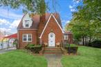 Very unique all brick cape in the heart of Elmont.  First floor has nice size living room with fireplace, formal dining room an eat in kitchen, mud room and an oversized primary suite. Second floor has 2 bedrooms and a full bath.  Basement is finished with full bath.  The house is heated with gas and has central air conditioning.