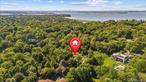 DEVELOPERS, VISIONARIES, AND BUILDERS! Welcome to 169 Middle Neck Road, Sands Point, NY â€” an incredible opportunity to create something truly special in one of Long Islandâ€™s most prestigious locations. Set on 2 flat, private acres, this property offers the perfect foundation to renovate, expand, or build your dream luxury estate in the heart of Sands Point. The existing 4, 600+ square foot expanded brick ranch has been completely gutted down to the framing, providing a blank canvas ready for your vision. With a 3 car garage and a solid structure already in place, this property is ideal for anyone looking to streamline the building process and bring a high-end design to life. The property also comes with unapproved plans for an 8, 000 square foot French Chateau with a pool and pool house, offering a glimpse of its ultimate potential. Located just moments from the Long Island Sound and the exclusive Sands Point Golf Club, this coveted address offers both prestige and tranquility. The propertyâ€™s generous acreage allows for a pool, tennis court, and/or a pool house â€” and even offers distant views of the Manhattan skyline. Whether youâ€™re a developer searching for your next luxury project, a builder seeking a rare opportunity, or a homeowner ready to design a custom masterpiece, 169 Middle Neck Road delivers the land, location, and potential to make it happen. This is your chance to create an iconic estate in one of the North Shoreâ€™s most desirable communities.