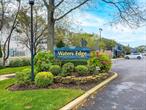 Welcome to Waters Edge, one of Freeportâ€™s most desirable waterfront communities! This beautifully maintained 1-bedroom, 1-bath upper-level co-op offers a bright, airy layout and modern coastal charm.Property Highlights: Spacious open-concept living room with sliding glass doors leading to your private balcony, perfect for relaxing or entertaining. Sunlit kitchen with ample cabinet space and convenient dining area. Comfortable bedroom with generous closet storage and soft natural light. Updated bathroom with modern fixtures and tile finishes. In-unit washer & dryer for your convenience. New hot water heater, central air conditioning, and assigned parking included. Community Features: Well-maintained complex surrounded by lush landscaping Pet-friendly community Minutes to Freeport Nautical Mile, waterfront restaurants, beaches, and marinas Close to LIRR, shopping, and major highways for an easy commute. A wonderful opportunity for first-time buyers, investors, or anyone seeking an affordable and peaceful coastal lifestyle on Long Islandâ€™s South Shore! A Must See.