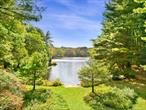 Rare Bedford Lakefront. First time offered in over 50 years! Fourteen peaceful acres with incredible frontage and sandy beach on 30-acre Swallow Lake. Incredible walking trails, lined with native plantings, down to the water. An incredible outdoor lifestyle with clean lake to swim, fish, kayak and paddleboard! An amazing setting owned by a noted physicist and environmental activist. Fabulous woodlands with benches throughout providing peaceful spots for reflection. Private setting with vintage Mid-Century Modern with clean lines brimming with potential. Dramatic Great Room with soaring ceiling and fireplace. Spacious Dining Room. Open Kitchen with breakfast area. Den with fireplace. Library/Office. Four Bedrooms, three with ensuite Baths. Detached Two Car Garage. Writerâ€™s Studio with water and electric. Incredible stone terrace with a fabulous water viewâ€”ideal for alfresco entertaining. Gorgeous grounds with level lawns and beautifully flowering shrubs. Situated in the heart of Bedford, close to the Henry Morgenthau Preserve with miles of trails. Most convenient location with easy access to commuting arteries, schools, the towns of Bedford, Pound Ridge and Stamford as well as the Metro-North train. An incredible opportunity!