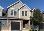 Beautiful Townhouse with two beds, three baths, and over 2, 100 sq ft. (2, 189 GLA per appraiser). Built in 2020, this home features an open layout, stainless steel appliances, granite countertops, a corner walk-in pantry, and hardwood floors. Primary suite includes hardwood floors, a walk-in closet, dual sinks & a walk-in shower. Second bedroom offers en-suite bath & walk-in closet. Full basement for storage, 1-car garage, laundry room, and low HOA dues. Located near shops, restaurants, and the NYS Thruway. Short sale subject to 3rd party approval. Preliminary steps completedâ€”need your offer to begin the anticipated quick review process.