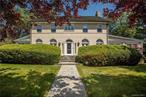 Rare opportunity to rent one of Beechmont Woods&rsquo; premier homes. This fully furnished, 7 bedroom, 5 1/2 bathexquisitely renovated charmer graces almost an acre of flat, lush property and is just minutes to Larchmont Village shops, restaurants and train. The grand foyer entrance announces a gorgeous large living room with fireplace and a stately dining room with magnificent floor to ceiling arched windows. Enjoy a truly stunning, new designer Kitchen/Great Room with all the latest amenities and finishes including high-end appliances, extensive custom cabinetry, hand-selected quartzite counters and multiple seating areas. Kitchen opens to family room, breakfast area and large patio. Bedrooms include a private 1st floor suite, a large primary with walk-in closet and ensuite bathroom and a lower-level bedroom suite with private entrance. Flexible layout provides multiple rooms for home office set-ups. Lower level offers a kitchenette and large rec room. A gem!