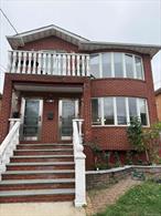 Welcome to this well-maintained and spacious 3-bedroom, 2-bathroom first-floor apartment in highly sought-after Oakland Gardens, District 26. This home features beautiful hardwood floors throughout, an open-concept living room, dining area, and kitchen filled with natural sunlight. Enjoy central A/C and mini split units, stainless steel appliances, dishwasher, and in-unit washer/dryer. Includes access to a finished basement, exclusive 4-car driveway, private backyard, and Tesla/EV charger â€” a rare find!Excellent location near Cunningham Park, Springfield Blvd, and Grand Central Parkway, with Q27, Q88, and QM5 express buses nearby for easy commute to Manhattan and Flushing. Close to shopping, supermarkets, restaurants, and top-rated District 26 schools including P.S. 203, J.H.S. 74, and Cardozo High School.