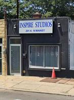 Fantastic opportunity to own or lease a commercial storefront on a busy main road in Freeport! This mixed-use unit offers excellent visibility and high traffic â€“ perfect for retail, office, or professional use. Features include a full bathroom, partial unfinished basement for storage, and a private backyard. Equipped with updated split units, providing central air and heat. Prime location, close to shops, transportation, and major highways. Great potential for both Owner â€“ users and investors!