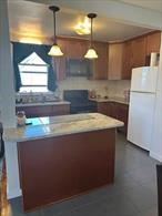 Beautifully updated END UNIT, and is one of the few larger 1 bedrooms at this complex!Additional windows with West, South & East side exposure which provides an overabundance of natural sunlight!  Open kitchen with granite countertops, beautiful cabinetry, and an island. Wood and ceramic floors throughout. Spacious bedroom that easily accommodates a queen or king sized bed. Low maintenance of $568. does not include the star rebate. 6 laundry rooms in the complex and numerous security cameras complex wide.  The proximity to public transportation, and highways, ensures convenient commuting.  Centrally located to all major highways, express bus to NYC at the entrance, or a 30 minute train ride to Grand Central Station. Parking pass allowed for vehicles registered to owner, that allows parking in any of the 6 parking lots. Wait list for the garage parking.  Minimum credit score is 700, 15% down payment and DTI ratios are 28/33. Data believed accurate but not warranted.