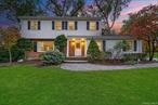 Welcome to this majestic colonial nestled in the heart of New City, NY, one of the top-rated suburbs in the state, only 25 miles north of Manhattan and recognized as one of the safest counties in the nation. This remarkable property offers the ideal combination of comfort, style, and convenience, making it a perfect sanctuary for families & empty nesters. Located just minutes away from the newly revitalized Downtown New City, you will enjoy easy access to an array of shopping, dining, entertainment and transportation options. The picturesque Clarkstown parks and recreational amenities are also within reach, ensuring a vibrant lifestyle for you and your family. This home is situated within the highly sought-after Clarkstown School District, known for its excellent educational opportunities. This spacious colonial features 4 generous bedrooms, 2 1/2 baths and boasts a highly desirable layout, ideal for entertaining. As you step inside, youâ€™ll be greeted by gleaming, newly renovated hardwood floors that flow seamlessly throughout the home, enhancing its inviting atmosphere. The eat-in kitchen showcases beautiful granite countertops, stainless steel appliances, and an abundance of wooden cabinetry. This delightful space opens up to an elegant dining room, perfect for hosting dinner parties and family gatherings. Also adjacent to the kitchen is a splendid family room, complete with a cozy gas fireplace and custom built-ins. The family room also features egress to the expansive patio and lush backyard, creating a wonderful indoor-outdoor living experience. The formal living room is bright and airy, with a large window that overlooks the serene, tree-lined street, providing a peaceful retreat for relaxation. A freshly painted updated powder room is conveniently located on the main level for guests alongside a laundry closet with shelving and an additional egress to the side of the home. Venture upstairs to discover 4 spacious bedrooms, each designed with comfort in mind. The primary bedroom is a true retreat, featuring a walk-in closet and a beautifully renovated en-suite bath. The primary bath boasts a granite counter, a luxurious shower with a seat and high-end cabinetry. A full second bathroom is conveniently located in the hallway, ensuring ample facilities for family and guests. For those seeking additional living space, the nearly 800sf of potential bonus space in the basement offers endless possibilities. Whether you envision a playroom, home gym, or entertainment area, this space can be tailored to your needs. Step outside to the lush, private backyard where you will find an extensive paver patio, perfect for summer barbecues, outdoor dining, or simply enjoying the tranquility of your surroundings. The yard offers plenty of room for recreation as well. With abundant storage options and closet space throughout, this home is designed with functionality in mind. New architectural roof with 10 year warranty and landscaping lighting in front yard.