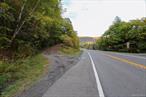 An extraordinary 41.73-acre parcel along Route 28 in the heart of the Catskills, offering the ideal blend of accessibility, natural beauty, and development potential. This expansive tract features gently rolling topography with multiple elevated building sites surrounded by mature forest and mountain vistas. Whether you envision a private estate, family compound, or small-scale subdivision, the possibilities are wide open. Located just minutes from Phoenicia, Belleayre Mountain, and the Ashokan Reservoir, this property sits within the Town of Shandakenâ€”home to some of the region&rsquo;s most desirable outdoor recreation, dining, and arts destinations. The land has easy road frontage for access, nearby electric service, and ample space for trails, gardens, or creative build sites. A rare opportunity to secure a large contiguous parcel on the main corridor of the Catskillsâ€”perfect for builders, investors, or anyone seeking a serene mountain retreat with convenience to Kingston, Woodstock, and Hunter. This property offers both water and electric service already in place. The water line runs along the 50-foot driveway strip, which is included in the ownership. Conveniently located within the Phoenicia Water District and zoned Hamlet Residential (HR), this parcel provides flexibility for a variety of potential uses.