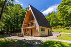 Tucked away in the woods just minutes from Minnewaska and Samâ€™s Point, this newly built A-frame offers the perfect blend of modern comfort and natural serenity. Designed by Martin and Nicolas Quirot, sons of renowned French architect Bernard Quirot, the home combines Scandinavian minimalism with Catskills characterâ€”light-filled interiors, natural materials, and seamless indoor-outdoor flow.The residence features four bedrooms and three bathrooms, with an open-concept layout centered around a double-height living space framed by walls of glass that bring the forest inside. The home is all-electric and energy-efficient, with five temperature zones that can be controlled remotely from anywhere in the world.Outside, a private hot tub sits beneath the trees, offering a peaceful retreat after a day exploring the areaâ€™s countless waterfalls, trails, and swimming holesâ€”many just minutes away, including Vernooy Kill Falls and the Blue Hole.Whether as a weekend escape or a high-performing short-term rental, this property captures the essence of Catskills living: design-forward, sustainable, and deeply connected to nature.Furniture can be included for a truly turnkey experience.