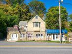 Unbeatable visibility on bustling Route 6 in the heart of Mahopac! This mixed-use property offers a ground-floor commercial space perfect for an office, showroom, or any business looking to stand out with maximum exposure. Above the commercial unit is a spacious two-level residential apartment featuring two bedrooms (lives like three), tall ceilings, and a private outdoor patio. The property boasts a massive rear parking lot that can accommodate 10â€“15 cars. An incredible advantage for any business, plus a large storage tent for added functionality. With its prime location, flexible layout, and unmatched visibility, this property is a rare opportunity for an owner-user or investor to secure a highly desirable asset in one of Mahopacâ€™s most high-traffic corridors.