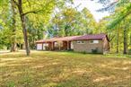 This Rhinebeck Mid-Century modern ranch home is sited on 1.37 acres only minutes from Rhinebeck village and the Rhinecliff train station. Located on Scenic Hudson River Historic River Road and directly across from the 750 acre Creed Ankony farmâ€™s bucolic fields. A well maintained country home with many recent updates such as the roof, furnace, garage doors, back deck, generator hook up etc... This 2246 square foot home features a large living room (with a wood stove) that is open to the dining room, a renovated eat-in kitchen with a fireplace, a sunny library/office room, a spacious sun room with vaulted ceiling & 3 sky lights and glass doors that lead to a 540 foot back deck and a separate laundry room. There are 3 bedrooms and 3 bathrooms with a private primary bedroom suite with a primary bathroom (separate shower & Jacuzzi tub) and 2 walk-in closets, plus 2 bedrooms each with a full bathroom. There is a large two car attached garage and a small barn with electric and a wood stove for storage or a workshop. Ideally located close to the village, hospital, library, train, Bard college and the Kingston/Rhinecliff bridge. This is a perfect weekend retreat or full-time home. Please see virtual 3D floor plan of the home and property.