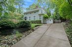 Move right in to this historic Stony Brook Charmer and enjoy the Village life. This home exudes all the warmth and history the Village is known for but has been renovated tastefully offering updates conducive to today&rsquo;s living. The interior includes an updated Kitchen with stainless steel appliances, high ceilings and is open to the Dining Room.A rear entry mud rooms leads to the Kitchen. The Living Room has original wide plank floors and a fireplace. Both the Living Room and Dining Room have sliders to a stone patio surrounded by gardens. The Primary Bedroom is on the first floor. A completely renovated Full Bath can also be found on the first floor. The second floor features 2 Bedrooms and a renovated Full Bath. This home offers charming detail inside and out. The property sits atop a rolling landscape and overlooks protected parkland. Extremely private but with an active Village lifestyle at your fingertips.Updates include a sprinkler system, new roof(Landmark PRO Solaris Premium Shingles), freshly painted exterior, landscaping, the crawl space in the basement was been recently dug out and re-supported. convenient to Stony Brook Village, Stony Brook Yacht Club and Harbor, Three Village Inn, The Jazz and the Reboli Center. Low Taxes69 hollow sits across the street from a Suffolk county Preserve- Nora Bredes 35 acres