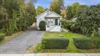 Welcome to this cozy and inviting 2-bedroom ranch-style home, perfectly situated on nearly a quarter acre of sprawling property in the picturesque and peaceful town of Bedford Hills. This delightful home blends comfort, character, and convenience â€” an ideal choice for first-time buyers or those looking to downsize without compromise. Step inside to find a newly renovated kitchen with custom cabinetry and modern finishes, along with a beautifully updated bathroom designed for both style and functionality. Gleaming hardwood floors flow throughout, adding warmth and charm to every room. Relax on the inviting front porch and take in the serenity of long summer evenings, or entertain family and friends in the spacious backyard, perfect for outdoor gatherings. The driveway offers ample parking for several cars, while the unfinished basement presents endless possibilities for additional living space, a home office, or a recreation room. Ideally located just minutes from town, youâ€™ll enjoy easy access to trains, buses, shopping, playgrounds, schools, the library, and major parkwaysâ€”everything you need right at your fingertips. This quaint Bedford Hills gem combines comfort, convenience, and affordability all in one, offering the perfect place to call home !!!