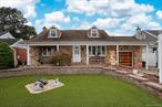Welcome to 993 Ferngate Drive in Franklin Square , the first time on the market in almost 50 years! This custom designed expanded cape located mid block on a quiet street has beautiful curb & yard appeal and unique features. Set on a 60 x 100 lot, this spacious three bedroom, two full bathroom residence features two extensions, an inviting front porch, and gorgeous pavers and stonework throughout the property. Turf front lawn is maintenance free! Enjoy outdoor living with a large in-ground solar heated pool complete with diving board and slide, 2 year old pool filter, new privacy fence and a charming gazeboâ€”perfect for entertaining. There is also an electronic awning, shed and sun visor in this custom designed fenced in yard. Open concept kitchen with stainless appliances, large family room, finished basement. This home has large rooms, many closets and a lot of storage. 8 year old roof. Updated 200AMP electric, young hot water heater,  boiler and CAC unit. Forced heat and a thoughtfully designed layout for year-round comfort. Attached garage with new custom door. Sprinkler/ alarm. Conveniently located near restaurants, shops and parkways. Motivated seller.