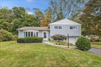 Located along a peaceful cul-de-sac in Ossining, there is a quiet grace to 19 Donald Lane. This beautifully maintained home welcomes you with sun-filled rooms and a sense of calm. As you walk up the new flagstone walkway and enter through the front door, you&rsquo;re greeted by the spacious living room lit by bay windows setting the tone for relaxed mornings or hosting evening guests. The open layout flows into a formal dining room with French doors to a large deck overlooking your private, partially fenced yard. Feel the crisp fall breeze with great cross ventilation when you want some fresh air indoors. Just a few steps up are three comfortable bedrooms and a full bathroom, offering a restful retreat at the end of the day. Downstairs is the opportunity for a home office, media room, or cozy den with powder room. The attached garage is long and, in addition to your car, provides room for extra storage and has a large workbench. There is also a full attic freshly insulated and an encapsulated crawl space. Every update speaks to the care of this home: new HVAC, oil tank, windows, and insulation. Conveniently close to shops, restaurants, and route 9A, this home offers a blend of serenity and practicality. Like you, your new home is here and ready for its next chapter.