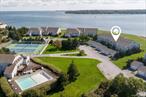 Waterfront! Experience the luxury of North Fork living in this bright and airy coastal condo. Located in the coveted Cleaves Point Development known for it&rsquo;s ideal location, picturesque views, and incredible amenities, this 2 bedroom 2.5 bath unit also includes a waterside deck, second floor balcony, full basement, attic and garage! The first floor features a seamless open floor plan including a dining area with glass sliders to the front balcony, kitchen with large center island and breakfast bar, sundrenched living area with sliders to the rear deck, and a convenient powder room. The second floor boasts two bedrooms, two full baths and a balcony with panoramic views off of the primary bedroom. All of this plus a clubhouse, fitness center, solar heated pool, marina, and tennis and pickleball courts. A stone&rsquo;s throw to renowned Greenport, wineries, farm stands, shopping, The Jitney and ferry to Shelter Island and New London, you&rsquo;ll find all you&rsquo;re looking for and more in this incredible retreat!