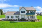 MAJESTIC best describes this meticulously maintained 4 bedroom 2.5 bath Colonial embraced by 2.1 acres of private, peaceful, park like property with Exquisite Mountain VIEWS , mature landscaping , large backyard for a Potential in ground pool and pool house , tent parties, baseball, football, Lacrosse , volleyball, hitting golfballs, Gardening, or whatever your heart desires in one of Warwick&rsquo;s Prestigious Open space neighborhoods COVERED BRIDGE. Located just minutes from all village amenities, Schools, shopping in the unique boutiques, dining in a vast array of Restaurants & Cafes , Award winning Library, enjoying the Wineries, Breweries , Farmers Markets, Apple Orchards , Hiking, Skiing plus a lot of other exciting adventures Escape to your own private oasis to enjoy your ultimate lifestyle in comfort with convenience. This HOME is Move in Ready and exhibits PRIDE OF OWNERSHIP  and features an inviting rocking chair front porch with a tin covered roof which invites you into a grand two story foyer , with a high window and a remote for the shade an Open Flowing Floor Plan which takes you into a bright and cheery Living Room with crown molding and adjoins an incredible Family Room with a wood burning Fireplace, Transom Windows and adjoins the renovated kitchen with granite counters and center island, bumped out breakfast nook with skylight and door to the covered deck.There is a private office/den with high speed internet a powder room and laundry room with washer & dryer, overhead cabinets, utility closet and door to outside. There is an oversized two car garage which is HEATED. The second floor consists of a Luxurious Primary Suite with a tray ceiling, walk in closet and Totally renovated primary bath with double sink vanity, large shower and top of the line BainUltra ThermoMasseur Bathtub. There are three more considerably sized bedrooms and another totally renovated full bath with a double sink vanity and tub/shower combination. There is also a huge walk out basement for further expansion which could be added to the square footage. There are many unique upgrades and extras such as Newer A/C, whole house water filter purification system, water softener, whole house is hardwired for a portable generator, high speed fiber internet, heated garage with epoxy poured floor, new custom blinds in the kitchen and family room, a remote controlled shade for the large window in the two story foyer plus a lot more that you will see for yourself when you step into this fairytale and preview what living in paradise looks like
