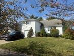 Peaceful Location!   Cozy Split House Located of Mid Block of Syosset Grove. In Miniutes from the LIE and Northern State Pkway.  3 Bed Rm, 2 Full Bath, with Family Rm With Fire Place, CAC, Gas Heating, Nice Back Yard!Walking Distance to Library, Shopping Area and Restaurants are Located 3Mins from the House