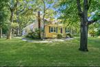 Welcome Home to this Charming 3-4 Bed/2 Bath expanded cape set on a beautiful large park-like corner property. This pristine 2600+ square foot home offers an abundance of both living and storage space and will surely check all of your boxes! The living space features a newly updated (2023) cook&rsquo;s kitchen with beautiful soft close cabinetry, stainless steel appliances, double ovens, gas cooktop, wood flooring, skylight and eat in dinette that overlooks the backyard through sliding doors that lead to the backyard patio. There is a kitchen pantry, coat closet, laundry and home office adjacent to the kitchen. The formal dining room is open to the living room ...with gleaming hardwood floors throughout, crown molding and a gas fireplace, this area is the perfect large yet warm space for entertaining. The adjacent Den is the perfect cozy space for those more informal moments featuring lots of natural light, hardwood floors and a closet offering the potential for a 4th bedroom if needed. The 2 first floor bedrooms share a spacious main bath which includes beautiful finishes, double sinks and a full tub. Upstairs, escape to your very own private primary suite featuring double closets, a window seat and primary ensuite bath. The basement offers lots of potential with a huge finished recreation room for additional living space, a finished 10x12 room and endless unfinished storage space. There is an attached large 2 car garage with interior access. Home also includes central air, gas heat ( 3 zone) and cooking, 200 AMP electrical service, alarm system, in-ground sprinklers, gutter screens, garage door opener and young siding (2016). The fully fenced backyard is your very own beautiful oasis featuring a large paver patio, a Gazebo and beautiful landscape. Located south of Montauk hwy. in South Country school district, this home is close to all of the beauty and prestige that Bellport has to offer including Bellport Village, Bellport Country Club, The Gateway Playhouse and beautiful south shore beaches. Space, charm and character....this home truly has it all.....The only thing this home is missing is YOU!