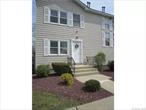 Beautifully renovated, spacious contemporary 1 Bedroom + loft - (perfect for office or 2nd bedroom) - end unit condo with cathedral ceilings and a great open floor plan in the NANUET SCHOOL DISTRICT.  Features include a pretty updated ceramic tile kitchen and bath, huge open living room and formal dining area with oak floors and sliders to deck overlooking grassy area. Central air, washer/dryer in unit, huge private storage room (10&rsquo; X 20&rsquo;) downstairs in same building. Plenty of convenient parking at front door. Top rated Nanuet schools. Walk to shopping, transportation - including NYC train and bus and seconds to all highways. Tenant pays all utilities - gas (heat, hot water, cooking, clothes dryer), electric and water. One indoor cat ok with additional monthly rent of $35.00. Sorry, no smoking, max 3 occupants (including part time) and one animal per unit. Photos taken prior to current occupant. Condo to be professionally painted and cleaned.