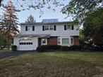 This true Four bedroom colonial features 1 king, 2 queen, 1 twin sz br&rsquo;s on second floor! First floor offers an entrance hall leading to to large eik, fdr, lvr, den wtih vaulted ceiling and 2 skylights, .5bth w/washer & dryer. 2nd floor main bathroom w/walk in tub, oak floors, Full unfinished basement with solid foundation and ample updated utilities. Attached garage all on 100 x 100 o&rsquo;sized property!