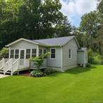 Peaceful, Polished & Move-In Ready, this charming home is tucked away in the scenic Shady Creek community within minutes of Eastdale Village. Whether youâ€™re looking for a weekend escape or a stylish starter home, this thoughtfully renovated ranch checks all the boxes. Inside, youâ€™ll find a bright, open layout with three freshly painted bedrooms and new flooring throughout. The kitchen shines with quartz countertops, subway tile backsplash, brand-new stainless steel appliances, and updated cabinetryâ€”ideal for both everyday living and casual entertaining. The full bathroom has been tastefully redone, and comfort is guaranteed year-round thanks to a new roof, new gutters, and energy-efficient spray foam insulation. Enjoy your morning coffee on the inviting three-season porch or host summer gatherings on the charming brick patio. Set in the Arlington Central School District and just minutes from Eastdale Village, shops, and transit, this home offers peace and privacy without sacrificing convenience. Plus, outdoor adventures await just steps away at Wappingers Creekâ€”perfect for kayaking, fishing, or simply soaking in nature. Charming, turnkey, and filled with characterâ€”this is a home youâ€™ll fall in love with the moment you arrive.