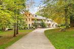 Welcome home to your private mini estate in the historic town of Stony Point! Nestled on nearly 3 acres of serene, tree-lined property, this beautifully designed residence offers the perfect blend of space, comfort, and privacy within 10 minutes of the Palisades Parkway for easy commuting. Step through the front door into a grand two-story foyer, where a sweeping open staircase ascends to a gallery like landing and interior balcony overlooking the main living areas. Sunlight pours in through oversized windows, creating a warm, inviting ambiance throughout.Thoughtfully designed for both everyday comfort and elegant entertaining, this expansive home features an open-concept kitchen that allows you to cook and host with ease. Whether you&rsquo;re gathering on the wraparound deck overlooking the pool or enjoying a more formal evening in the elegant dining room, every detail supports effortless living.Furthermore, throughout this level of the home are two peaceful, light-filled sunrooms perfect for reading, relaxing, one of which becomes a cozy haven on rainy days steps from the family room, living room and den/library. The seamless flow between living areas makes hosting effortless, while still providing intimate corners for quiet reflection.Upstairs features 4 generously sized bedrooms and 3 full bathrooms. The luxurious primary suite is a true retreat, complete with an elegant fireplace, abundance of room for that quiet reading nook, a private balcony for morning meditation, and a spa-like en-suite bath. Three additional bedrooms provide comfort and privacy for family or guests.The fully finished walkout lower level is a home in itself, featuring a second kitchen and abundant space for extended family, guests, recreation, or a private home office. Whether you&rsquo;re accommodating multiple generations or seeking the ideal layout for entertaining, this flexible space adapts to your needs.Step outside to discover a backyard sanctuary, meticulously designed for outdoor enjoyment. Entertain in style with expansive decking, a sparkling in-ground pool, a gazebo for al fresco dining, and a jacuzzi for ultimate relaxationâ€”all surrounded by the natural beauty of your own private landscape.Whether you&rsquo;re entertaining or simply enjoying the peace and quiet, you&rsquo;ll love the expansive layout and tranquil surroundings, schedule your private showing today.