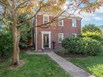 Welcome to this classic 1935 brick Colonial featuring timeless character and modern updates. Set on a lovely property, this home offers a detached garage and a covered open porch, perfect for relaxing or entertaining guests.Inside, youâ€™ll find hardwood floors throughout and a renovated kitchen with granite countertops, stainless steel appliances, and an open layout flowing seamlessly into the dining areaâ€”ideal for todayâ€™s lifestyle.This home blends classic charm with contemporary comfort, offering the perfect balance of style, space, and functionality.There are 3 bedrooms on the 2nd floor as well as an updated full bathroom. The home has generous attic space which is ideal for extra storage.  There is currently an active rental permit which expires in Spring of 2026... This is ideal for investment property. Please note that the home has Central Air on 1st Floor.....