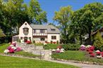 Perched gracefully above the tree lined streets of Bronxville PO&rsquo;s coveted Cedar Knolls neighborhood, this classic 1913 Tudor blends timeless architectural character with modern day comfort. Set on .38 acres, 46 Dellwood exudes curb appeal with its handsome stonework and beautifully landscaped grounds. Gleaming hardwood floors and gorgeous crown molding add warmth and character throughout . A welcoming foyer opens to a sparkling sitting room, an ideal spot for a home office. The living room, anchored by a stunning stone fireplace, invites cozy gatherings while the spacious dining room is perfect for everyday dinners and holiday celebrations. The kitchen features stainless steel appliances and adjoins a comfortable family room with sliding doors that open to the back patio, ideal for indoor outdoor living. A powder room completes the first floor. Upstairs, the primary bedroom offers a lovely marble bath and adjoining bedroom that is perfect as a dressing room, nursery or work out space. Two additional bedrooms share a beautifully updated hall bath. The third floor bonus space (240 sf incl in sf) provides flexibility, whether used as a home office, studio or au pair suite. The historic colony of Cedar Knolls has a wonderful neighborhood association. Some of the events include a summer block party/bbq, egg hunts and holiday parties! Enjoy the best of both worlds, peaceful suburban living just over a half mile to the Bronxville train station and Village, with a quick 32 minute commute to Grand Central.
