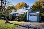 Welcome to this inviting expanded Cape Cod that combines classic charm with plenty of living space. The sun-filled living room features a beautiful picture window that bathes the space with natural light and flows seamlessly into the adjacent dining room, perfect for gatherings and everyday living. The spacious galley kitchen offers an informal dining area where another large picture window beautifully frames the natural scenery of the backyardâ€“bringing the outdoors in from the moment you enter the front door. The first floor features a bedroom, a fully updated bathroom with a walk-in shower, a home office or den, and a family room with a cozy wood-burning stove, sliding glass doors leading to the backyard, and custom cabinetry that neatly conceals the washer and dryer. Upstairs you&rsquo;ll find two additional bedrooms, a vintage 1960&rsquo;s full bathroom with charming pink tile, and a walk-in hallway closet for storage. Additional highlights include a single-car garage, a full basement with walk-out access to both the garage and yard, a new roof, and updated windows. The backyard is inviting and private, ideal for relaxing and entertaining. This home offers the warmth, comfort, and space you&rsquo;ve been searching for.