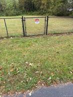 Flat 1/2 buildable acre with proper approvals and building permits. (Lot previously had building permits but owner decided not to build). Level 1/2 acre partially cleared.