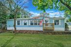 Come make this Diamond in the rough your new home. Update it anyway you want. This manufactured home is the largest one they made. It features 3 bdrms, 2 full bths, lg EIK thst is open to the formal Dining rm and Lvrm. kitchen sliding doors lead to private deck. Sachem schools. Close to airport, trainstation, buses, several shopping centers and major roadways. roof was done about 10 years ago, hot water on demand system.