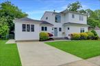 Meticulously maintained and thoughtfully expanded, this 4-bedroom, 3-bath Colonial-style home offers a welcoming layout and excellent curb appeal. The exterior features clean lines, a wide driveway, and well-kept landscaping that reflects pride of ownership.Inside, natural light fills the two-story entryway through a stunning arched window, creating a bright and open feel. The home features a generous living room ideal for relaxing or entertaining, an inviting dining room, and a modern kitchen with stainless steel appliances. Each area flows effortlessly for everyday living or hosting guests.The second-floor primary suite provides a spacious and private retreat complete with a full bath and generous closet space.Additional highlights include a neatly finished lower level offering versatile space for work, recreation, and storage, and a private backyard with a patio area perfect for outdoor enjoyment.Impeccably maintained and move-in ready, this home offers the perfect opportunity to personalize with your own modern touches and design flair.**Proof of funds required.**