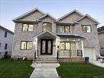 Welcome to spectacular Colonial style new construction house in Mineola. First floor included Living room, Formal dining room, and a large Family room with electric Fireplace. Modern kitchen with quartz countertop, large island and wet bar and walk in pantry. Cooktop stove, wall Oven /microwave combo and dishwasher. Including first floor bedroom with bath attached and powder room. Second floor included huge master bedroom with specious modern bathroom, walk-in closets and additional closets and open Balcony. Second bedroom with bath attached and 2 additional Big bedrooms and full bath. Laundry room washer and dryer also in second floor. Full attic with pulldown stairs. Basement full finished, porcelain tile flooring, separate entrance and half bath. Professionally landscaped 6 zone irrigation system. Covered front porch and remote garage opener. Close to public and private schools, train stations, banks and shopping centers. Energy Efficiency Anderson windows, insulation, and 2 zone HVAC systems.
