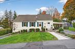 COMPLETE CUSTOM RENOVATION + ADDITION! A rare find at 6 Ludlum Place in the heart of the Village of Historic Goshen. Tucked away on a quiet cul-de-sac, this stunning 4-bedroom, 2-bath Cape Cod residence has been completely transformed with a thoughtful, high-end renovation that blends modern comfort with timeless character. Offering approximately 1, 680 square feet of living space, this home was designed for easy living, entertaining, and convenience.Step inside and experience true single-level living with no stairs. The brand-new gourmet kitchen is a showpiece, featuring custom cabinetry with elegant gold hardware, a designer backsplash, quartz countertops, tile flooring, stainless steel appliances, and a gas range. Just off the kitchen, sliding doors lead to a Trex deck and hot tub surrounded by beautifully landscaped perennial gardens and a fully fenced yard, creating the perfect outdoor retreat for relaxing or entertaining.The bright and airy living room welcomes you with gleaming hardwood floors and a cozy fireplace that stays with the home. The newly renovated primary suite is a highlight, offering a spa-like full bath with sliding glass doors, tile flooring, quartz countertops, and a spacious walk-in closet. Three additional bedrooms provide flexibility for guests, a home office, or additional living space. A new washer and dryer are conveniently located on the first floor, making daily living effortless.This home was renovated with energy efficiency in mind, featuring state-of-the-art HVAC and hot water systems. It also offers an ADA-accessible entrance directly from the carport, ensuring comfort and accessibility. The exterior is equally impressive with Bluestone patios, lush landscaping, two driveways plus a carport, and exceptional curb appeal.Located just steps from the Heritage Trail, this property is ideal for anyone who loves walking, biking, or enjoying the outdoors. Commuters will appreciate the easy access to Route 17 and nearby bus service, making travel throughout the Hudson Valley and to New York City a breeze. For recreation and entertainment, the home is minutes from LEGOLAND New York Resort, local wineries, scenic hiking trails, Woodbury Common Premium Outlets, and the United States Military Academy at West Point.This prime Village of Goshen location allows you to walk to everythingâ€”local shops, restaurants, caf&#233;s, parks, and community amenitiesâ€”offering the perfect blend of small-town charm and modern convenience. Thoughtfully renovated from top to bottom, this residence provides both style and functionality, making it an exceptional opportunity for buyers looking for a move-in ready home in one of Orange Countyâ€™s most sought-after locations.With its ideal location, elegant finishes, spacious layout, and commuter-friendly setting just an hour from New York City, 6 Ludlum Place truly stands out as a one-of-a-kind village gem. Donâ€™t miss the chance to make this beautifully renovated Cape Cod your next home.