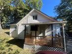 Cozy two bedroom home within walking distance to the village shops and restaurants in Highland. Great location on a dead end street and great opportunity for the saavy buyer. Sold as-is. Buyer to pay NYS and any local transfer taxes. Offers with financing must be accompanied by pre-qual letter; cash offers with proof of funds. **Please see agent remarks for access, showing instructions and offer presentation remarks.**