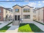 258-14 147th Road Is a BRAND NEW CONSTRUCTION CUSTOM BUILT TWO FAMILY home that will captivate you from the moment you arrive with its warm & welcoming energy. Sitting on a 40x100 lot on a beautiful, quiet tree lined street of the Rosedale/ North Woodmere Border and spans over 4000 sq/ft of living space. Perfect opportunity for buyers looking for space, plus income generating rental property to assist with mortgage payments. Configured as 4 bedroom 2 bath rental unit which has the ability to generate $4, 500/month to assist with mortgage payments. The Owners unit is a 4 bedroom 2 bath, and can easily be used as a garden/basement duplex to to create additional living/recreational space. Both units enjoy expansive sun drenched, modern open concept living/dining areas which provide great space for entertaining. Stunning chefs granite kitchen equipped with floor to ceiling custom cabinetry, adorned with a full fleet of stainless steel appliances & island for bar stool seating. Spacious bedrooms with ample closet space. The elegant primary suite is equipped with a private en suite with spa like finishes. Down the hall a fully tiled bathroom is shared between the additional bedrooms. A bonus amenity is a designated laundry room on every floor. The high ceiling full finished basement has both interior and exterior access, with its unique setup this space can be used as the perfect in-law suite, media den, home office, storage space or additional recreational space. Construction includes brand new select wide oak wood flooring, recessed lighting, Central HVAC, electrical, heating and plumbing systems. 258-14 147th Road is located just off Francis Lewis Blvd, Rosedale Road, Hungry Harbor Road. Short blocks to Rosedale LIRR, JFK Airport & Green Acres Commons which houses a wide array of restaurants, cafes, shopping centers.