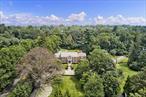 Extraordinary legacy property on one of the most coveted streets in Scarsdale. Set in the heart of Murray Hill estates, this 1.25 acre unrivaled brick Georgian Colonial was originally designed and built by the distinguished Walter Collet, boasting masterful craftsmanship, exquisite millwork, slate roof, grand proportions, and an ideal layout for both grand entertainment and quiet enjoyment. The majestic grounds and stately circular driveway lead to a breathtaking entry hall and sweeping curved staircase with access and views to the magnificent backyard oasis. To the right, discover an elegant formal living room with detailed moldings and a handsome wood burning fireplace, and a wood paneled library/billiards room and a second wood burning fireplace with french doors to the backyard. To the left, the baronial dining room is adorned with a magnificent hand painted wall mural and leads to a fully outfitted butlerâ€™s pantry, gourmet chefâ€™s kitchen with a large center island, vast custom cabinetry, and high-end appliances, a sun-filled breakfast room overlooking the spectacular lush grounds, and a massive family room with soaring ceilings and french doors to the backyard ideal for al fresco dining. The first floor also has a convenient mudroom, 2 powder rooms, and en suite bedroom perfect for guests. Ascend the front or back staircase to arrive at the second floor anchored by a showstopping ownerâ€™s suite with a sitting room, dressing room, office/exercise room with a sauna, two outfitted walk-in cedar closets, and a spa-like bath with a separate soaking tub. There are four secondary bedrooms and three full baths and the lower level includes a large recreation room with a third fireplace, superb storage, and a 3-car garage. Perhaps most noteworthy about the estate is its remarkably large and idyllic 1.25 acre park-like property, with outstanding mature landscaping and specimen plantings, sprawling lawns, and a gunite pool with bluestone patio and cabana. Located minutes from Scarsdaleâ€™s award-winning schools, restaurants, shopping, world class golf courses, the Metro North station, and local highways and parkways, 8 Cooper Road offers the very finest in convenience and luxury.