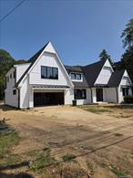 Exquisite European-Inspired Home â€” Modern Luxury Meets Classic CharmThis Beautifully New Built Home offers the Magnificent Charm !!! Enjoy the Feeling of a Brand New Residence!!!Every inch of this home reflects exceptional craftsmanship and a unique European influence. The builder has hand-selected and imported high-quality materials and finishes directly from Europe, creating a truly custom and timeless space.Kitchen & Living AreasThe state-of-the-art kitchen features an oversized island with stunning black quartz countertops, complemented by a white marble-design quartz backsplash that extends to the ceiling. Elegant white cabinets with black handles and crown molding add sophistication and height to the space.Outfitted with premium Italian appliances, each piece adds its own distinctive charm. The kitchen also includes luxury extras such as a pot filler, wine cooler, and a custom pantry with built-in shelving â€” everything youâ€™ve always wanted in your dream kitchen.The open-concept layout flows seamlessly into the dining area and living room, making it ideal for both everyday living and entertaining.Bedrooms & BathroomsThis stunning home features 4 spacious bedrooms, with the potential to expand to 6 bedrooms, if desired. Each bedroom boasts ample closet space and beautiful 7 1/4 oak wood flooring throughout.Upstairs, youâ€™ll find two full bathrooms complete with radiant heated floors, towel warmers, and an oversized shower in the primary suite. A stylish first-floor bathroom and a dedicated laundry room add both function and comfort.Additional FeaturesImported European black tilt-and-turn windows -easy to clean and open as doors for fresh air and accessImported European exterior doors, designed with distinctive modern style.â€¢ Central air conditioning, 200-amp electrical service, and efficient oil heat.Custom wood flooring throughout, offering warmth and modern elegance.The Laundry Room Can Either Be On The First Floor Or Second FloorDon&rsquo;t miss this opportunity to view this unique home!! Photo Of A Previously Built Home.