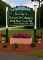 Welcome to Kathy&rsquo;s Resort & Cottages. Nestled on over 5 acres of beautifully maintained grounds, this well-established, family-run resort features 18 total units, including a 2, 500 sq. ft. main house with private living quarters and office, 8 charming A-frame chalets, and 9 fully equipped housekeeping apartments. Each unit offers modern kitchens and updated baths with tubs and showers, providing guests with the perfect balance of Adirondack charm and home-like comfort. Resort amenities include a 20&rsquo;x40&rsquo; heated in-ground pool, picnic tables, gas grills, park, ping pong table and open space for recreation, and ample parking. This property offers excellent cash flow potential with both strong summer and winter rental income proven history of success supported by loyal, repeat clientele. Conveniently located on the south end of Lake George Village, the resort is just 3 minutes from the lake, shops, restaurants, and all local attractions, and a short drive to West Mountain, Gore Mountain, and countless Adirondack outdoor activities. With a proven history of success, this property offers long-term, sustainable income and an exceptional investment opportunity. Don&rsquo;t miss your chance to own one of Lake George&rsquo;s beloved resort destinations!