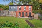 The Marvelous Two-Story Brick HomeThis timeless beautifully restored two-story brick home perfectly blends modern features with classic historic charm. Spanning approximately 1, 100 square feet, the thoughtfully designed layout offers two bedrooms and two full bathrooms, flowing seamlessly throughout the space.Upon entering through the extended mudroom hallway, youâ€™ll find a spacious bedroom complemented by a sleek, modern bathroom. As you ascend to the loft area, an original stone accent wall adds character and warmth. At the top of the stairs, the second full bathroom features floor-to-ceiling custom tile work.The cozy living room is perfectly situated between the gorgeous eat-in kitchen and the large upstairs bedroom, creating an inviting and functional living space. Off the gourmet kitchen, an expansive rooftop deck provides stunning views of the homes and streets belowâ€”ideal for relaxing or entertaining.Located just steps from the Rondout Creek, this home is within walking distance of restaurants, shops, and the lively Kingston Strand, offering both comfort and convenience in a vibrant setting.